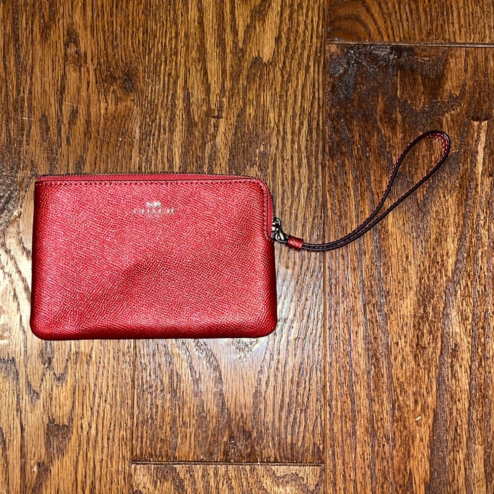 BRAND NEW coach wristlet red.